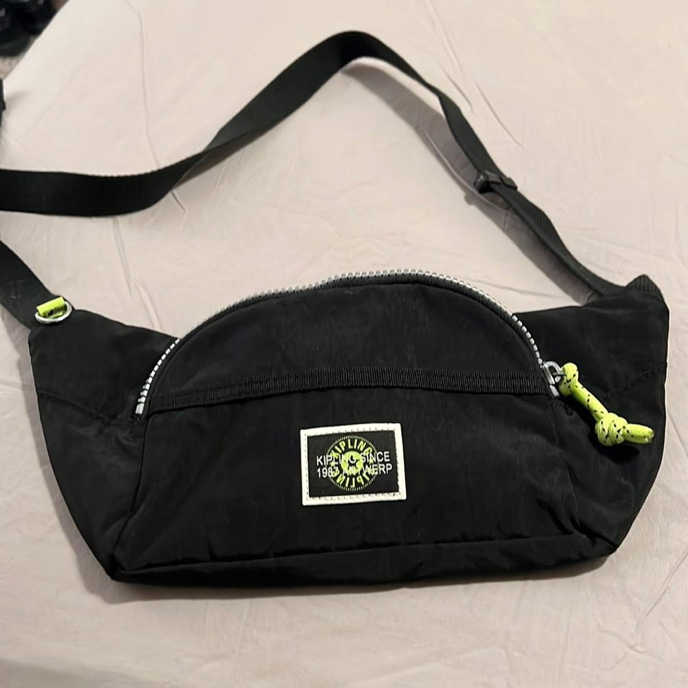 Kipling Fanny pack black with neon details adjustable strap.